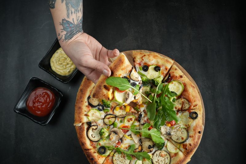 pizzaluce roasted vegetable pizza with goat cheese